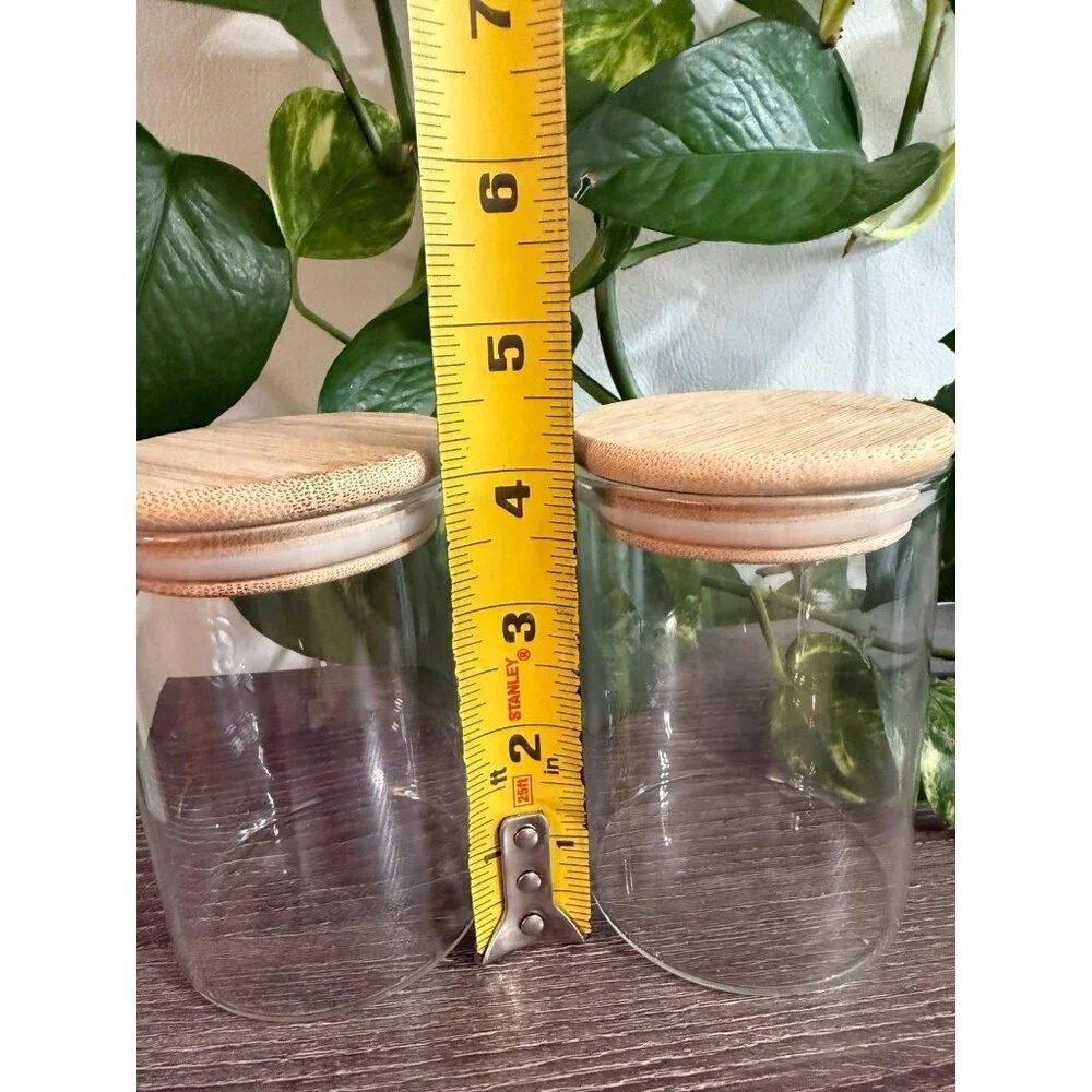 Two wooden sealed jars